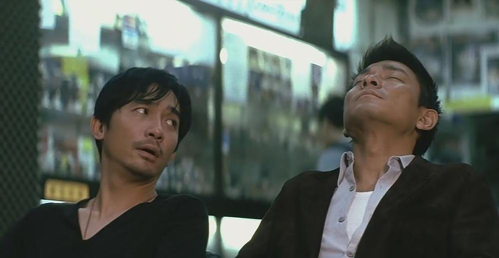 اندی لاو و تونی لیانگ چائو وی در فیلم سینمایی «اعمال شیطانی» (Infernal Affairs)