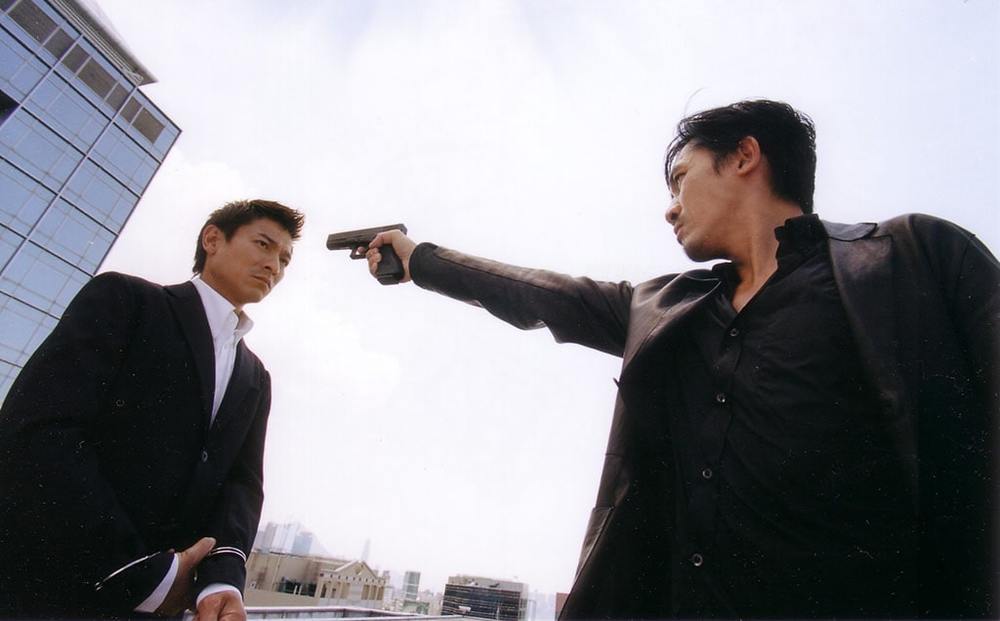 اندی لاو و تونی لیانگ چائو وی در فیلم «اعمال شیطانی» (Infernal Affairs)